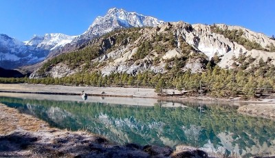 Annapurna II Reflects in the Serene Waters of Kiliin Lake Image